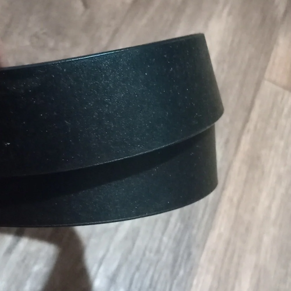 Talbots black leather belt has black & gold buckle  can be worn for any occasion